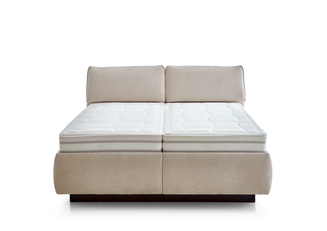 Frontale Ansicht eines beigen Polsterbetts mit zwei Matratzen und gepolstertem Kopfteil.