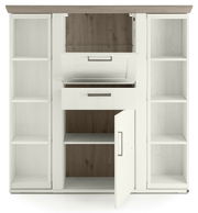 Frontansicht eines weißen Highboards mit Karussell, offenen Regalen und Schubladen.