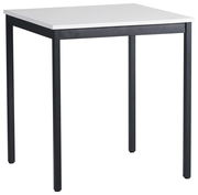 Moderner Esstisch mit weißer Tischplatte und schwarzen Metallbeinen, seitliche Perspektive