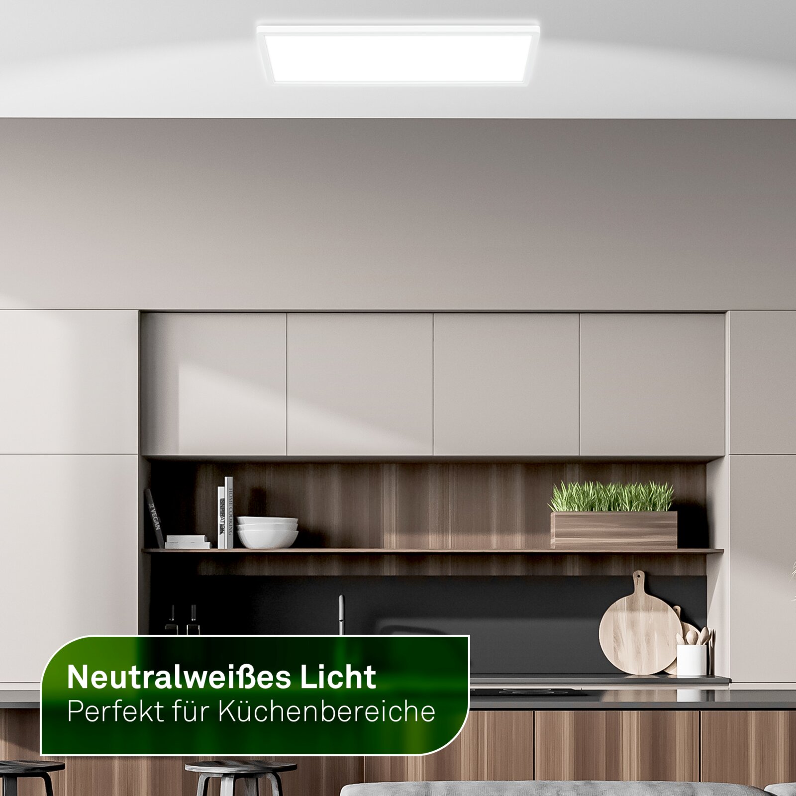 Rechteckige weiße LED-Deckenleuchte mit neutralweißem Licht in einer modernen Küche, aus frontaler Perspektive von leicht unten