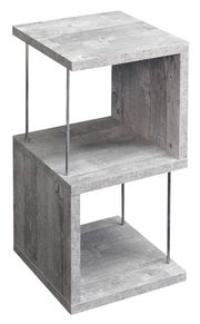 Modernes Standregal der Serie RIFF in Betonoptik, perspektivisch von vorne links gesehen.