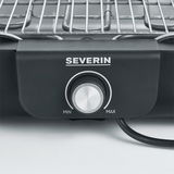 Nahaufnahme eines Tischgrills mit Grillrost und Temperaturregler von SEVERIN.