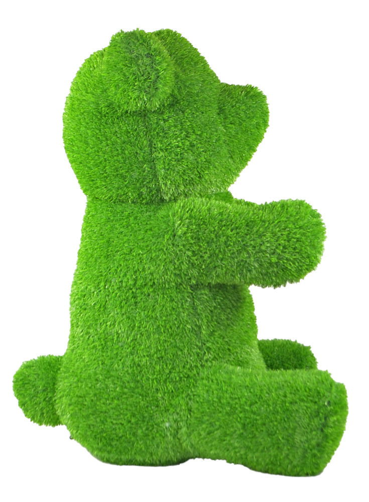 Grüne Bärenfigur aus Gras, seitliche Perspektive, Gartendekoration