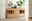Linea Natura Sideboard GEORGIA Holz-Sideboard mit Schubladen und Glaseinsätzen, dekoriert mit Pflanzen und Lampen, seitliche Perspektive