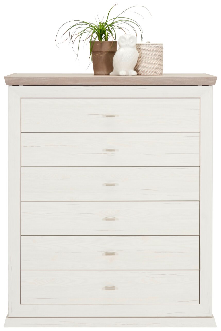 Weiße Kommode mit sechs Schubladen, dekoriert mit einer Pflanze, einer Eulenfigur und einem Korb auf der Oberseite, Frontalansicht.