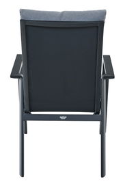 Rückansicht eines Comfort Plus Stapelsessels mit schwarzem Rahmen und grauem Kissen.