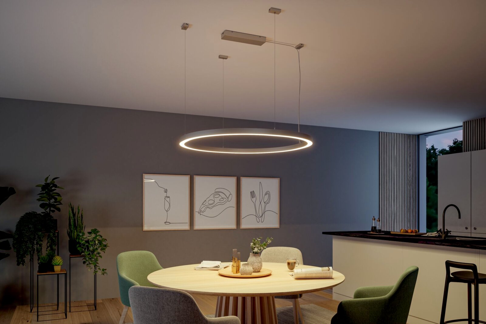 PAULMANN Power Box Zigbee LINION Moderne ringförmige LED-Pendelleuchte in Schwarz mit warmweißem Licht über einem Esstisch in Wohnküche, Ansicht leicht von unten in schräger Perspektive