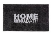 Schwarzer Badteppich mit der Aufschrift 'HOME YOUR BATH' in weißer Schrift, von oben betrachtet.