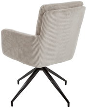 Achterkant van een moderne fauteuil met een beige, geribbelde stoffen bekleding en een zwart metalen frame.