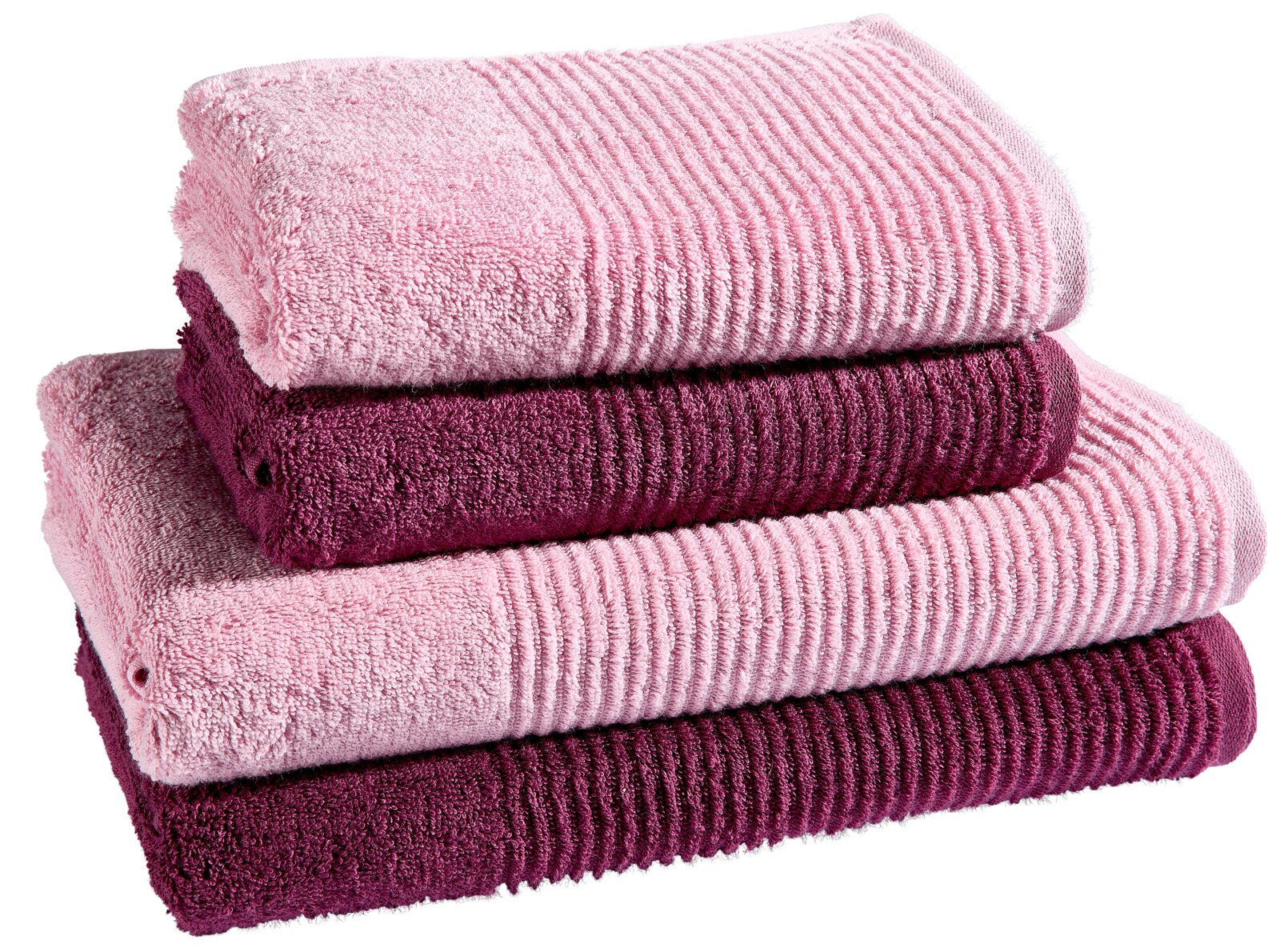Gestapeltes Set aus vier gerippten Frottee-Handtüchern in Rosa und Dunkelmagenta, schräg von vorne in Seitenansicht fotografiert