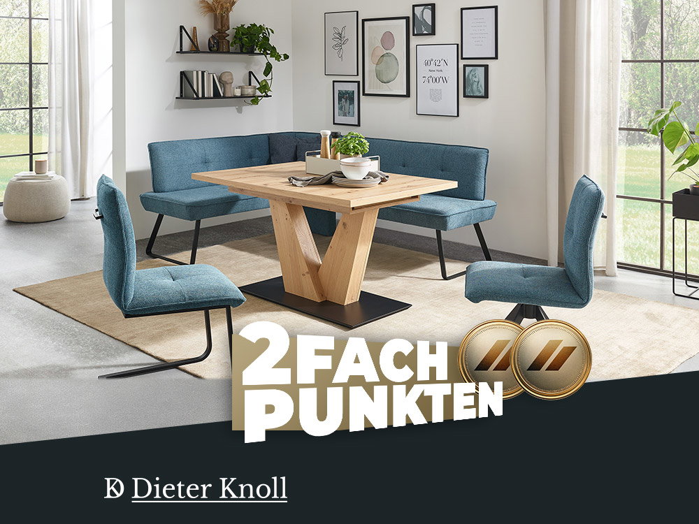 Essgruppe von Dieter Knoll mit blauem Ecksofa, Holztisch und Stühlen. Aktion: 2-fach punkten.