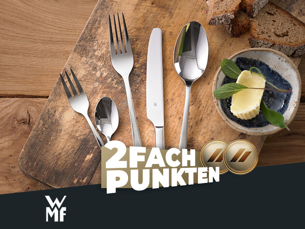 WMF-Besteck auf einem Holztisch mit Brot und Butter. Aktion: 2-fach punkten.