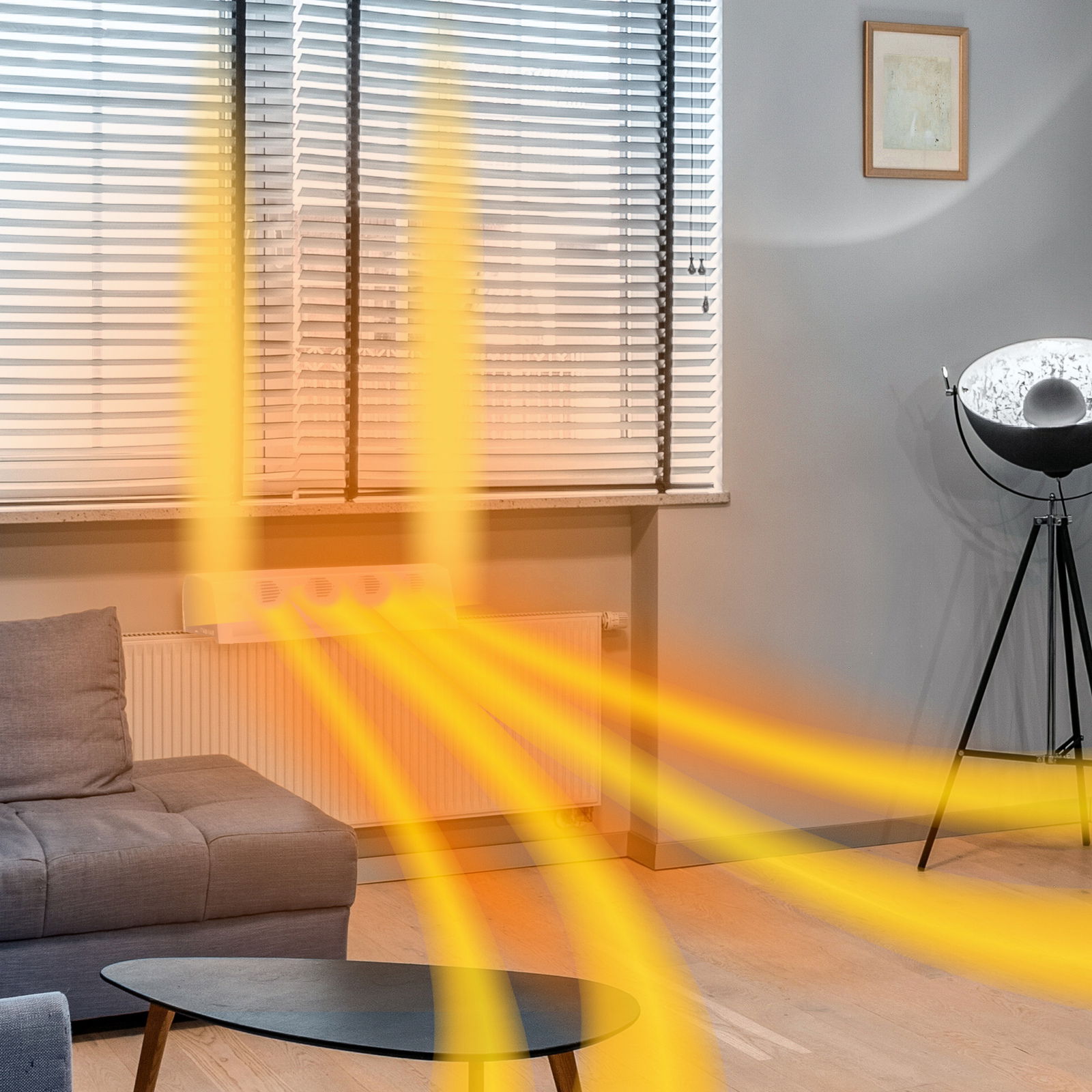 Heizkörper mit Invictus Therma Boost, der warme Luft in einem modernen Wohnzimmer verteilt, seitliche Perspektive