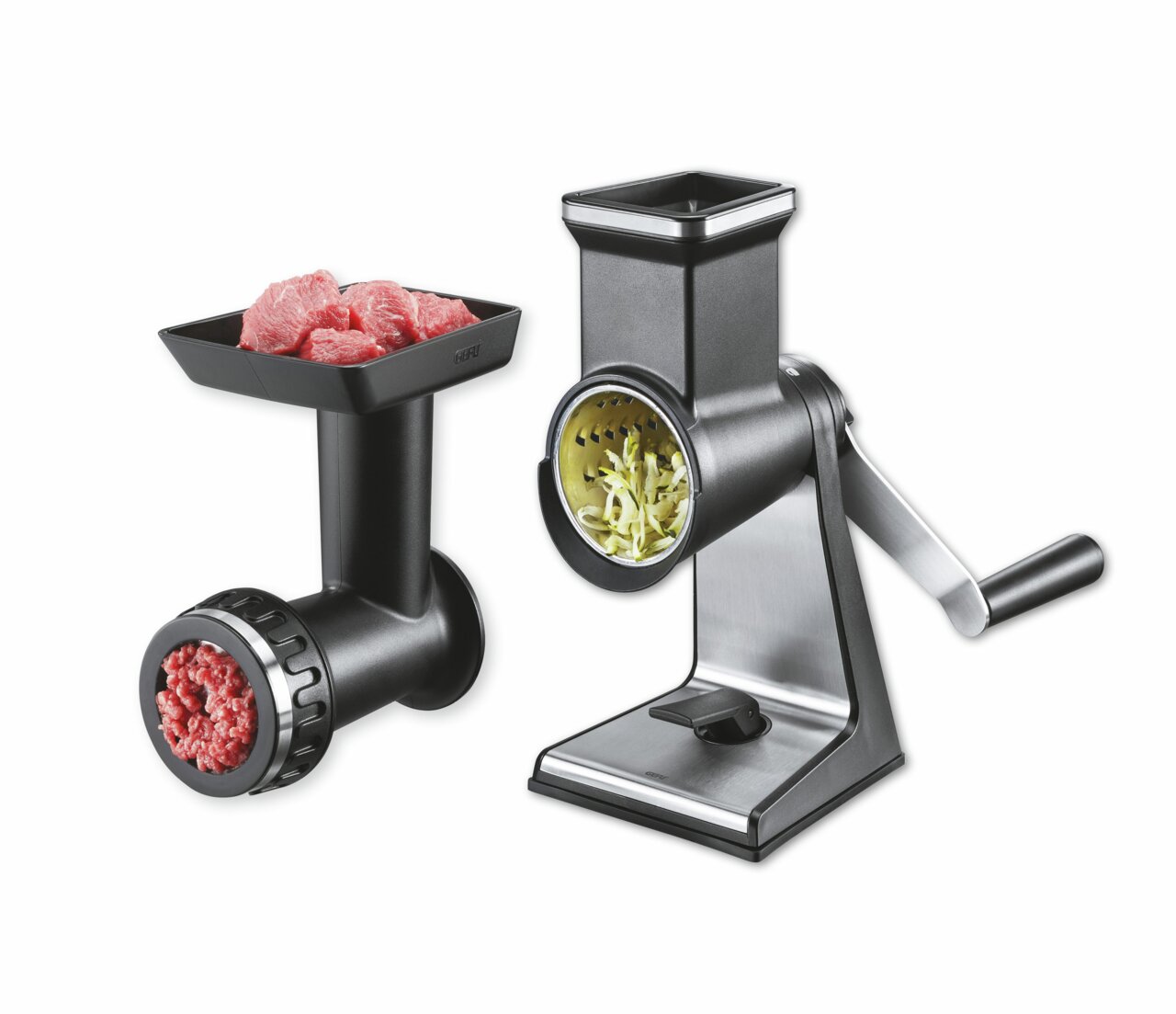 Set bestehend aus Trommelreibe und Fleischwolf, seitliche Perspektive, zeigt zerkleinertes Fleisch und geriebenes Gemüse.