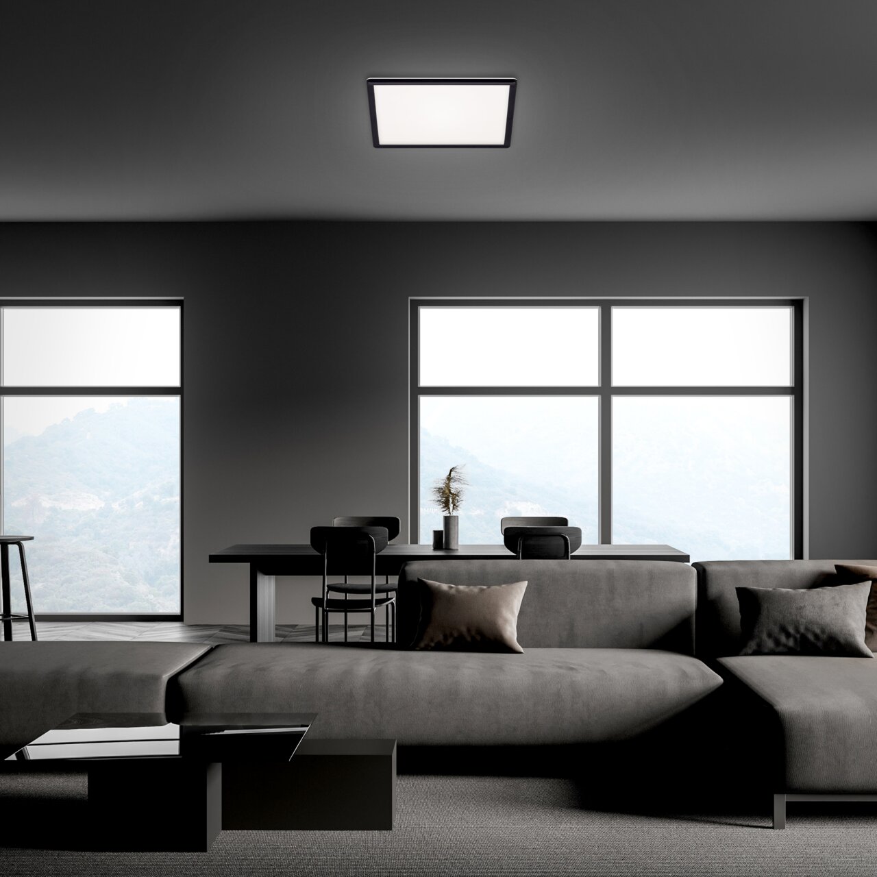 Moderne LED-Deckenleuchte in einem stilvollen Wohnzimmer, Perspektive von unten.