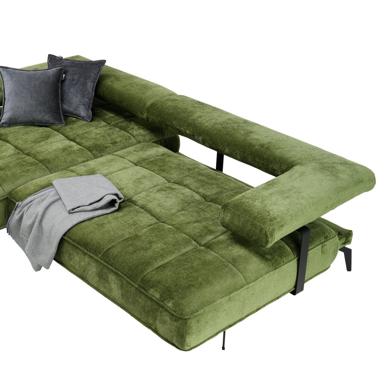 Groene longchair-set met een fluweelzacht oppervlak, twee grijze kussens en een grijze deken, gezien vanuit vogelperspectief.