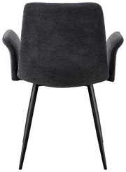 Achterkant van een grijze fauteuil met zwarte poten