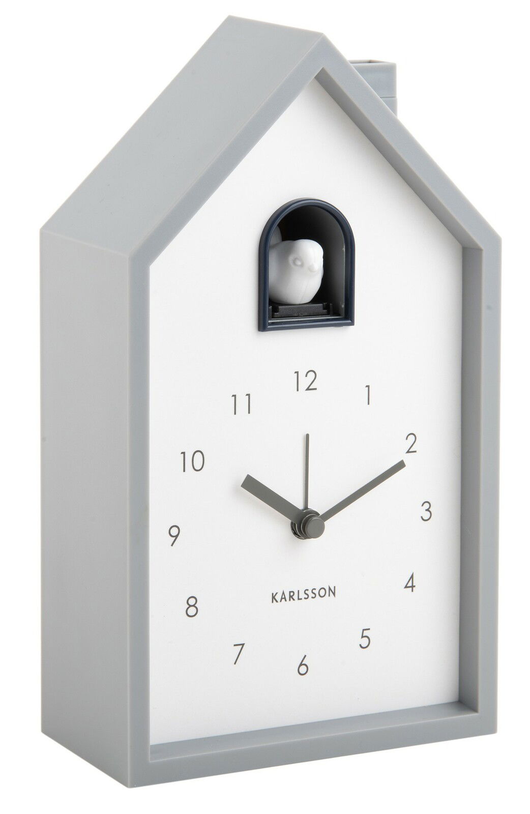 Moderner Wecker in Form eines Hauses mit Kuckucksvogel, seitliche Perspektive