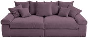 Großes, lila Sofa mit mehreren Kissen, Vorderansicht