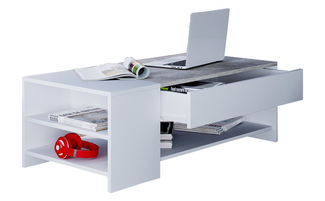 Moderner Couchtisch in Weiß mit grauer Tischplatte, seitlichen Regalfächern und ausgezogener Schublade, darauf Laptop und Zeitschriften, in schräger Frontansicht von oben.