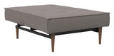 Grauer Funktionssessel Innovation Schlafsessel SPLITBACK in seitlicher Perspektive mit Holzbeinen.