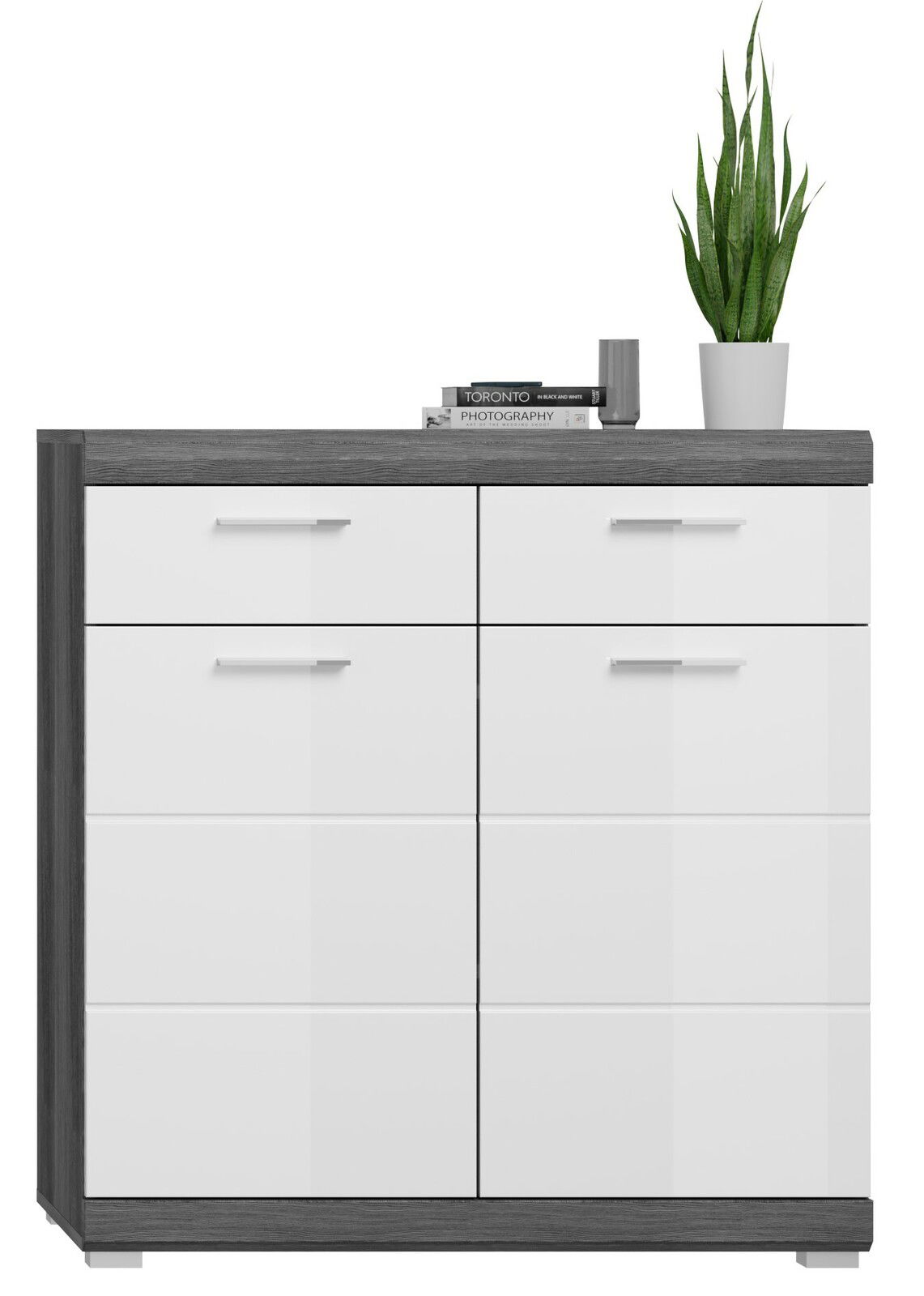 Frontale Ansicht eines modernen Garderobenschranks mit weißer Hochglanzoberfläche und dunklem Holzrahmen, dekoriert mit Büchern und einer Pflanze.