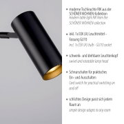 Moderne Tischleuchte RIK in Schwarz mit goldfarbener Innenfläche, Nahaufnahme des schwenk- und drehbaren Lampenkopfs in schräger Seitenansicht vor hellem Hintergrund