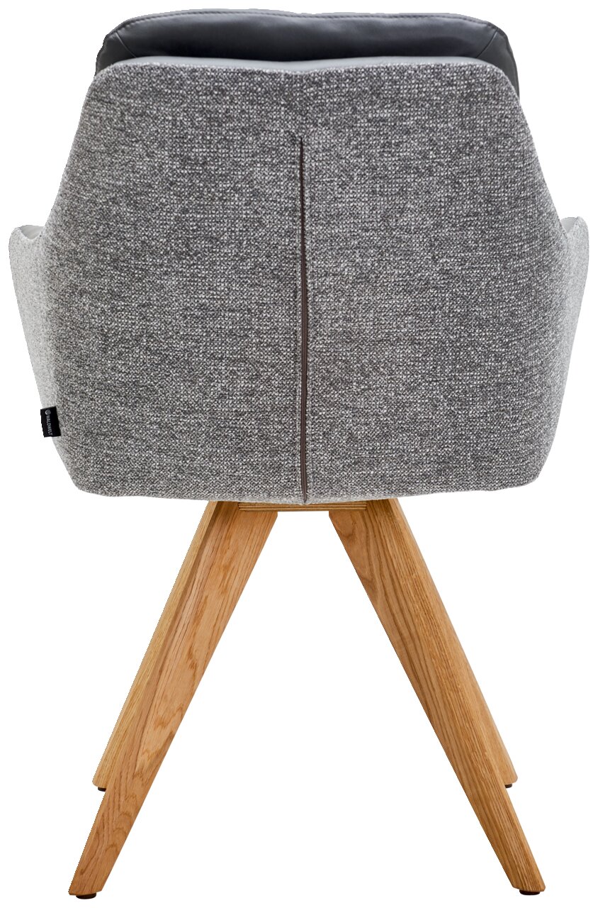 Waldwelt Armlehnstuhl ARUBA Rückansicht eines Armlehnstuhls mit grauem Stoffbezug und Holzbeinen