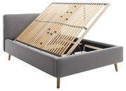 Graues Polsterbett mit hochgeklapptem Lattenrost, seitliche Perspektive