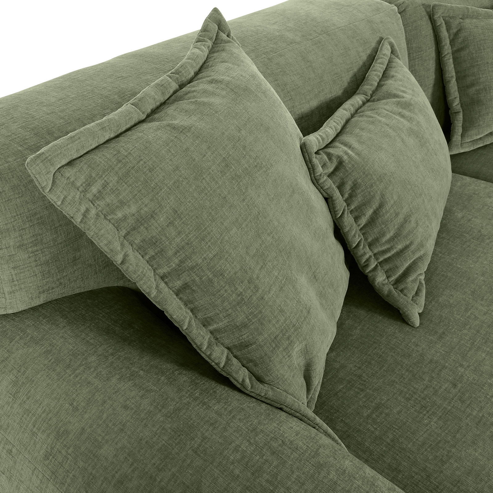 Grüne Rundecke mit weichen Kissen, Nahaufnahme von schräg oben