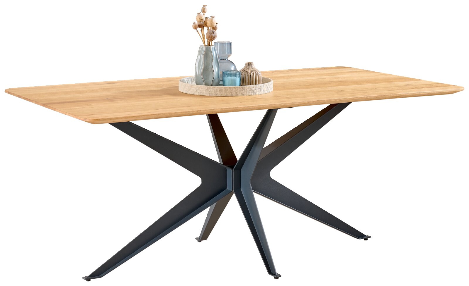 Dieter Knoll Eettafel TAVOLO Rechthoekige houten eettafel met licht eiken tafelblad en zwart metalen stervormig onderstel, gefotografeerd in schuin vooraanzicht op witte achtergrond