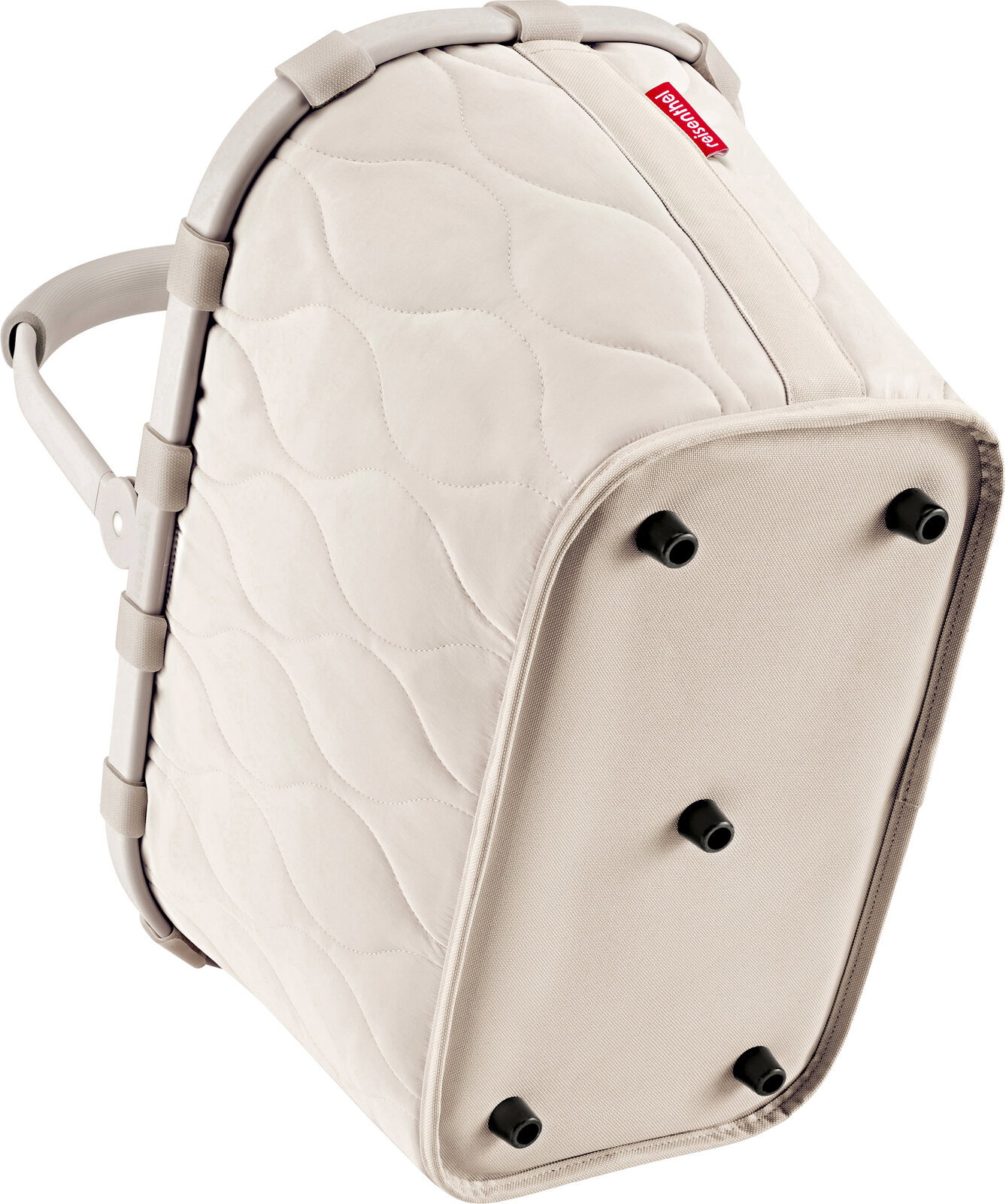 Beige, gesteppte Reisetasche mit Tragegriff und Standfüßen, schräg von unten/seitlich (Bodenansicht) fotografiert