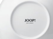 Rückseite eines weißen Tellers mit der Aufschrift 'JOOP! MADE IN GERMANY'.