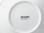 Achterkant van een wit bord met het opschrift 'JOOP! MADE IN GERMANY'.