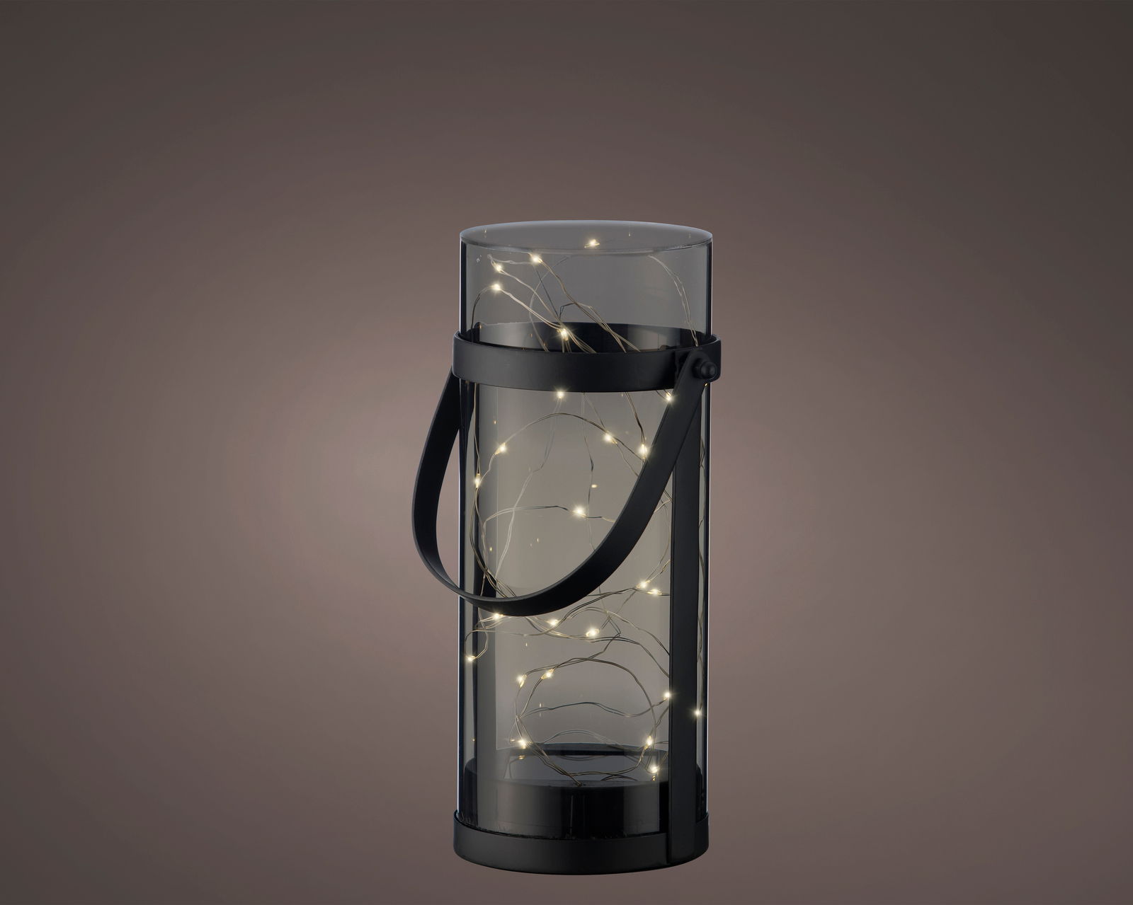 Zylindrische Solar-Laterne aus Acryl mit schwarzem Griff, beleuchtet mit kleinen Lichtern, seitliche Perspektive