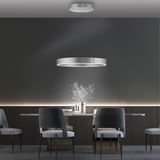 Moderne Pendelleuchte PURE E-CLIPSE in einem eleganten Esszimmer, von unten betrachtet.