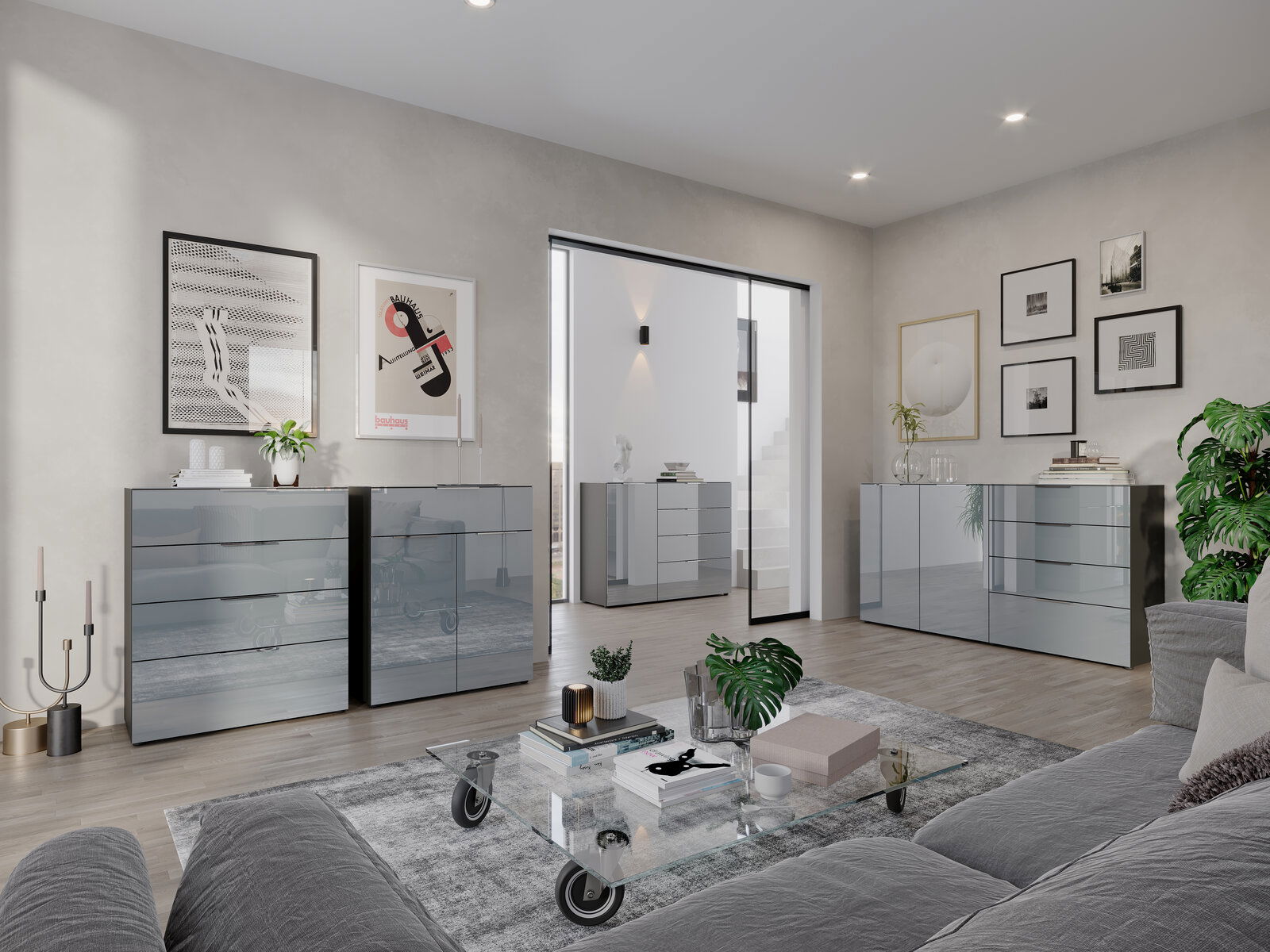 Novel Sideboard OAKLAND Moderne Wohnzimmeransicht mit mehreren glänzenden Kommoden und Sideboards in einem eleganten, minimalistischen Design. Perspektive von der Seite mit Blick auf die gesamte Raumgestaltung.