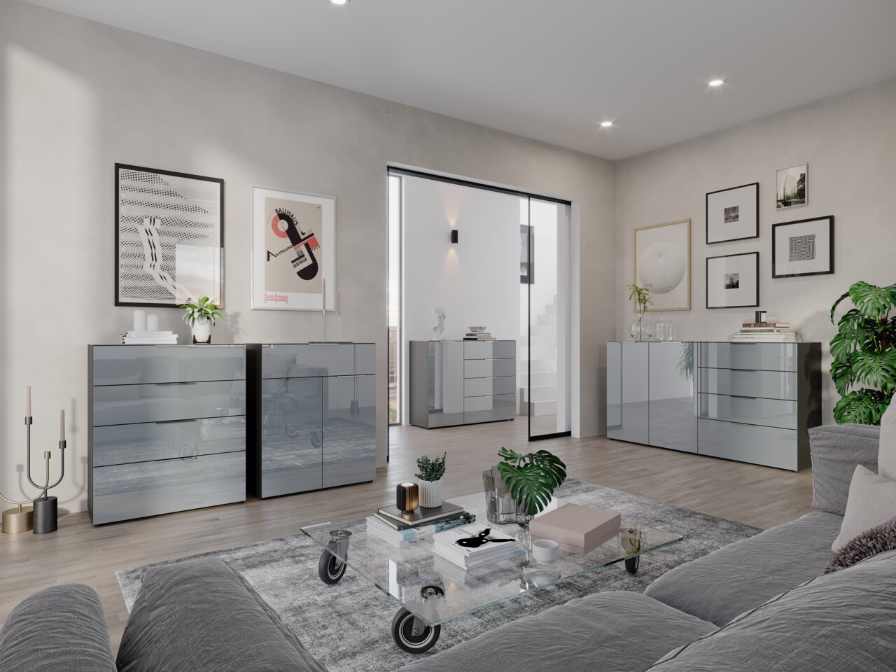 Moderne Wohnzimmeransicht mit mehreren glänzenden Kommoden und Sideboards in einem eleganten, minimalistischen Design. Perspektive von der Seite mit Blick auf die gesamte Raumgestaltung.
