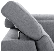 Detailansicht einer grauen Wohnlandschaft TIM mit verstellbarer Kopfstütze und modernem Design.