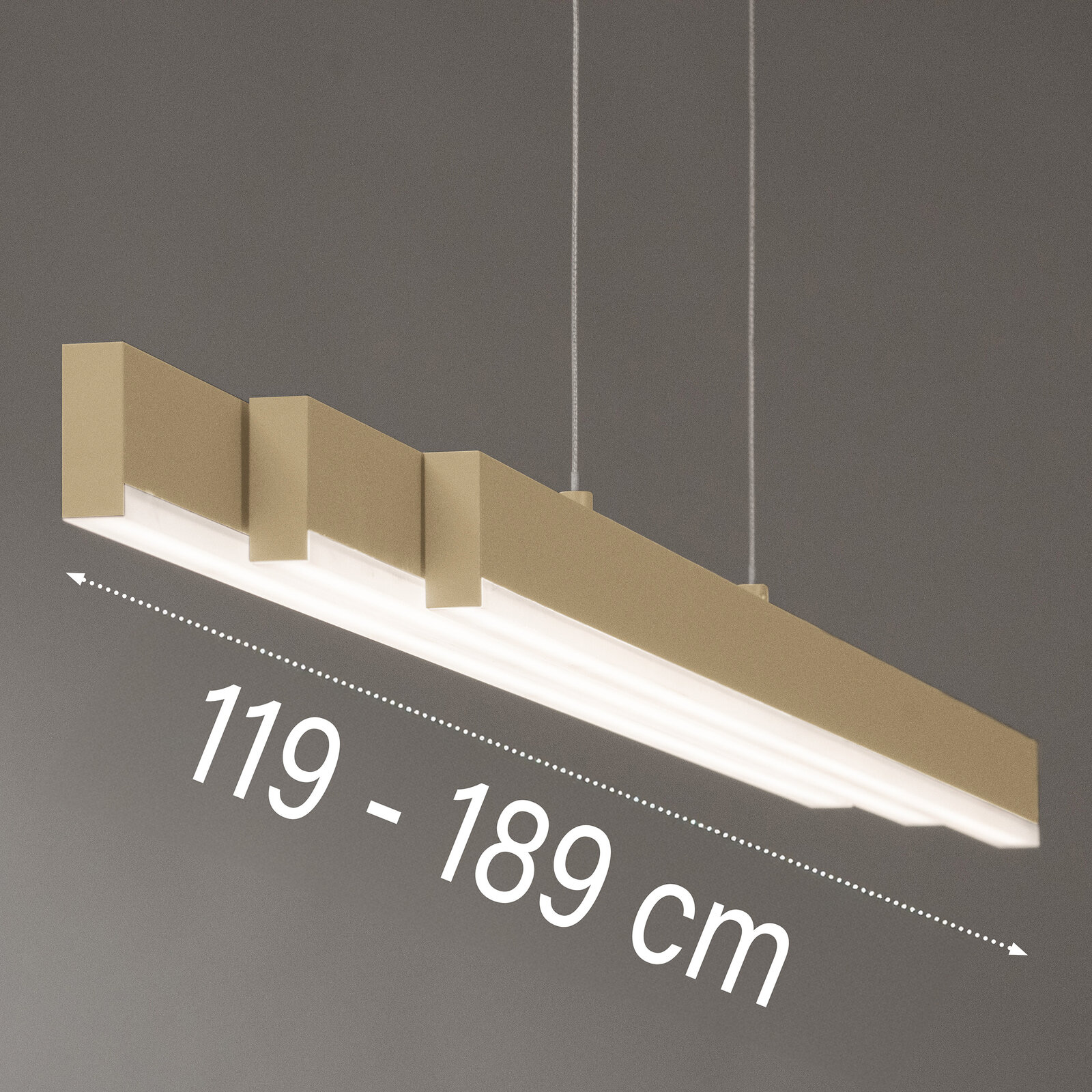 Moderne, längliche LED-Pendelleuchte in Gold/Beige mit weißem Diffusor, an zwei Seilabhängungen, Länge 119–189 cm, schräg von unten fotografiert.