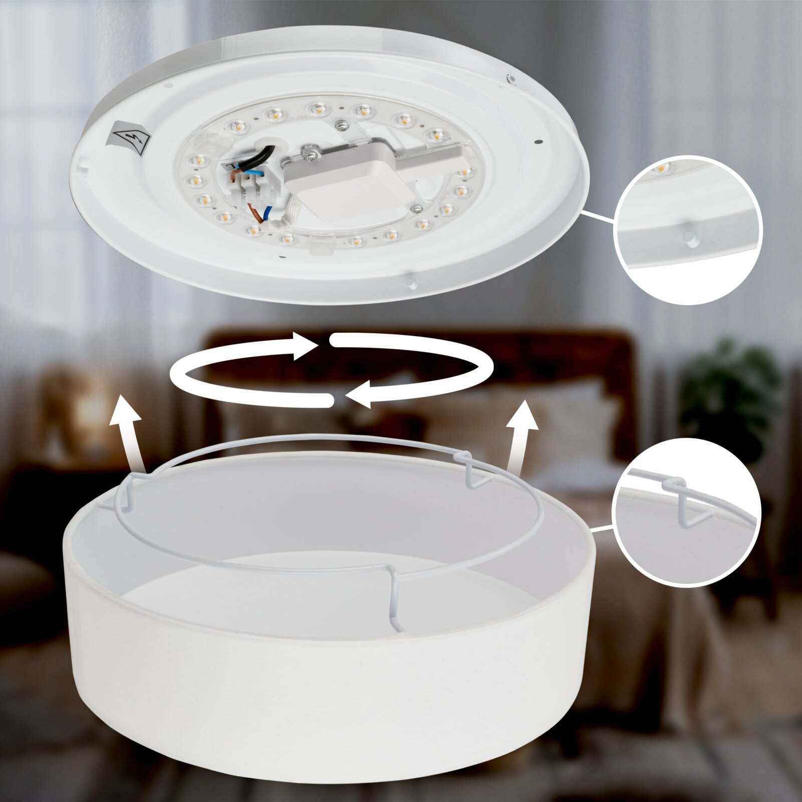 Weiße runde LED-Deckenleuchte mit abnehmbarem Diffusor/Schirm und Drahtbügeln, gezeigt in explodierter Darstellung aus Untersicht (Blick von unten) zur Montage an der Decke.