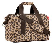 Tas met luipaardprint en bruine hengsels, zijaanzicht