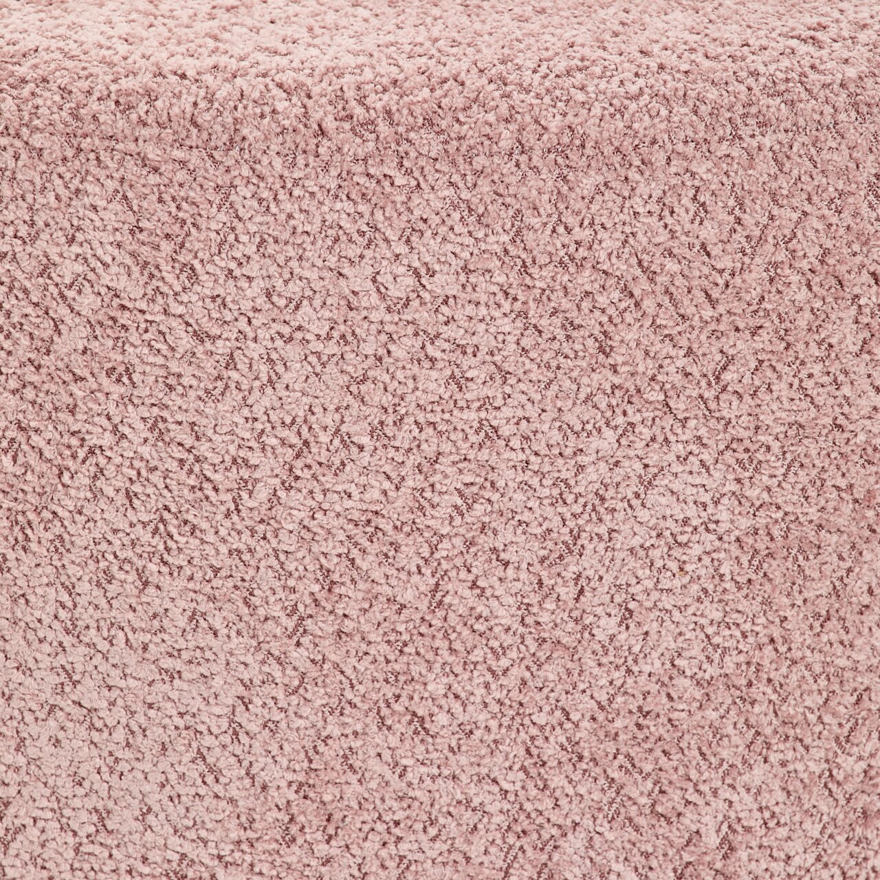 Nahaufnahme eines rosa strukturierten Hockers aus Bouclé-Stoff, von oben betrachtet.