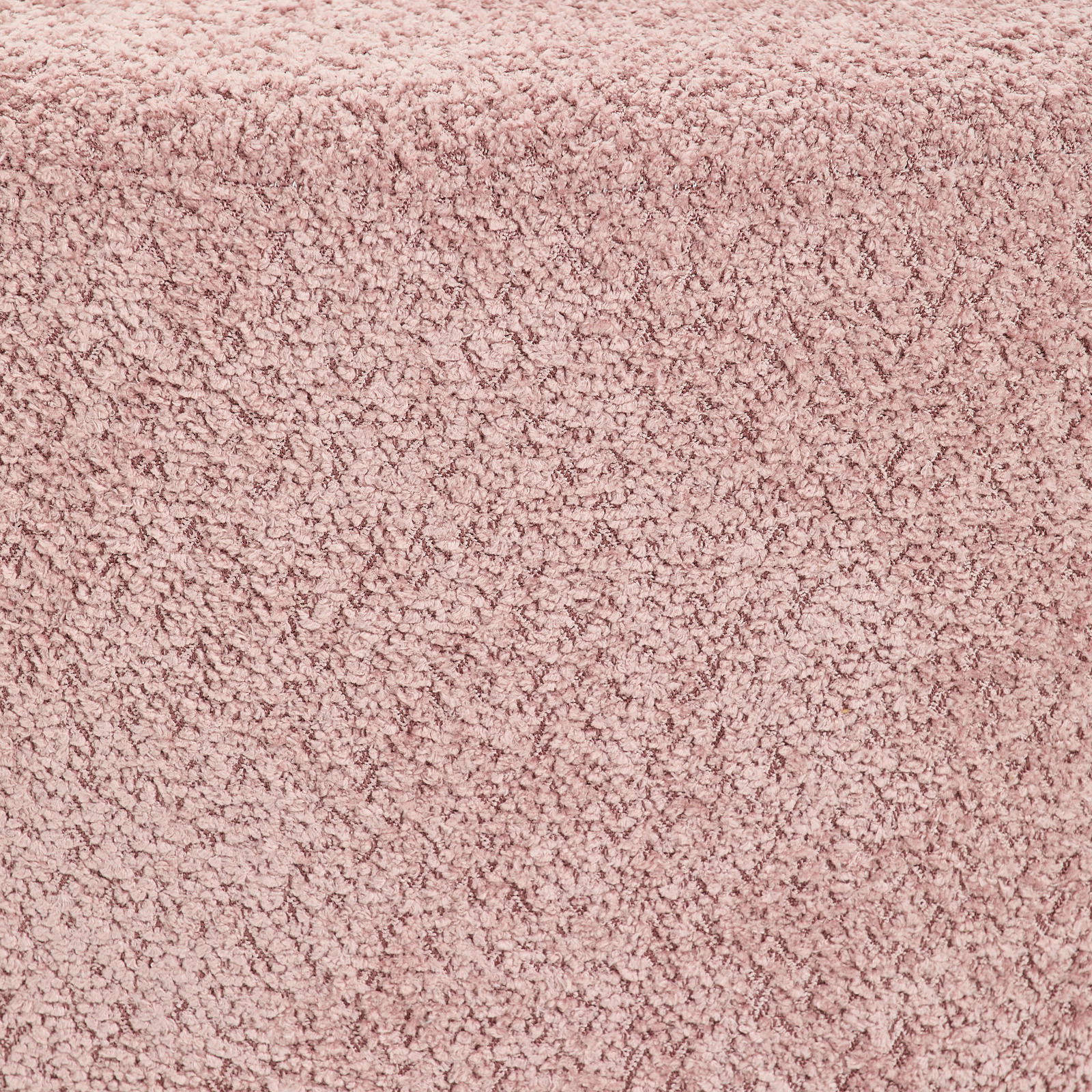 Nahaufnahme eines rosa strukturierten Hockers aus Bouclé-Stoff, von oben betrachtet.