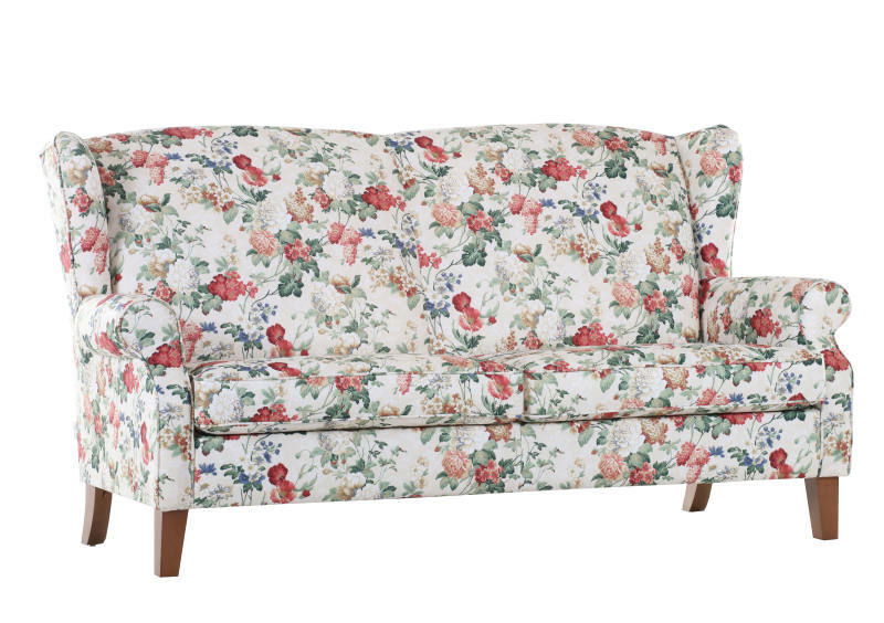 Blumiges 2,5-sitziges Sofabank-Modell KIMBERLY von Zurbrüggen, frontal abgebildet.