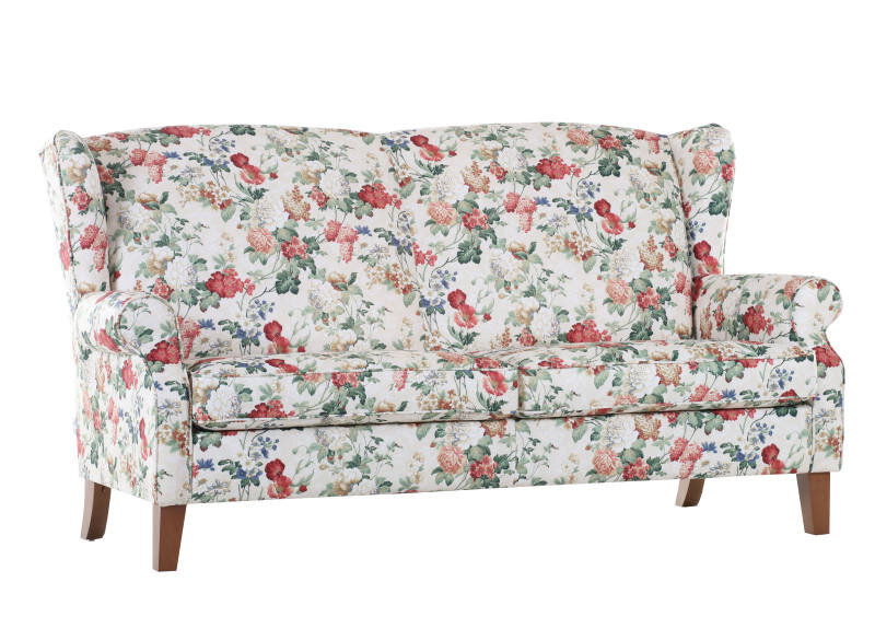 Blumiges 2,5-sitziges Sofabank-Modell KIMBERLY von Zurbrüggen, frontal abgebildet.