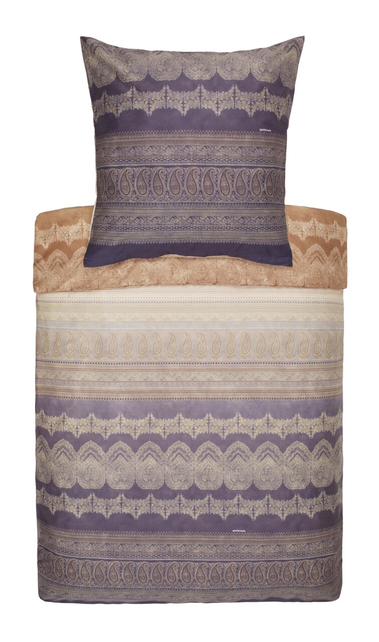 Beddengoedset met oosters patroon in paarse en beige tinten, gezien van bovenaf