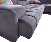 Graues Ecksofa Beldomo Speed SPLIFF S mit weicher Polsterung und bunten Kissen, seitliche Perspektive