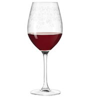 Rotweinglas Chateau mit filigranem Muster, gefüllt mit Rotwein, seitliche Ansicht