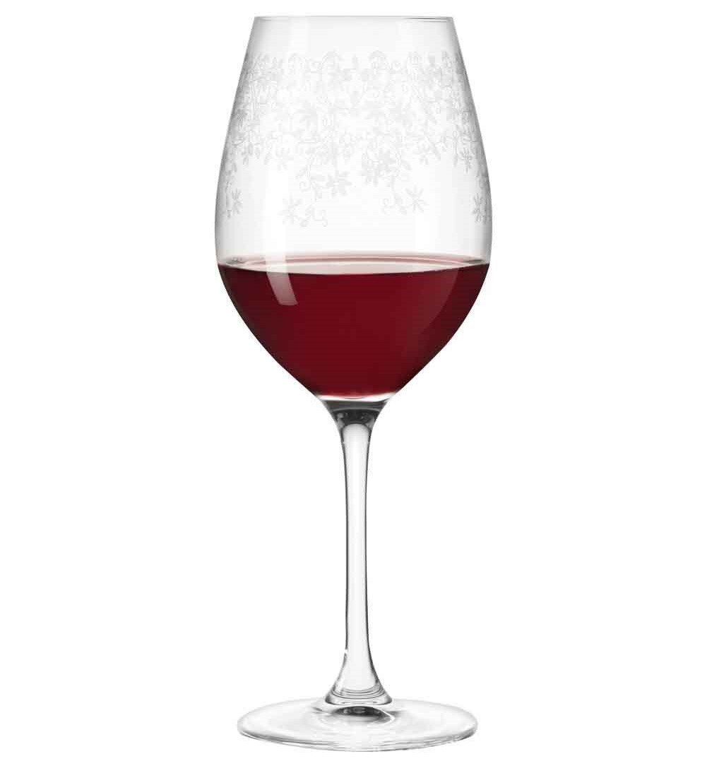 Rotweinglas Chateau mit filigranem Muster, gefüllt mit Rotwein, seitliche Ansicht